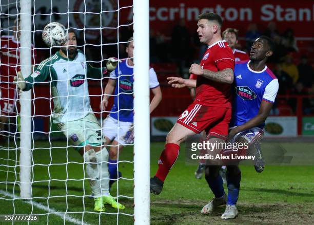 Billy Kee of Accrington Stanley scores his team's first goal past over Bartosz Bialkowski of Ipswich Town during the FA Cup Third Round match between...