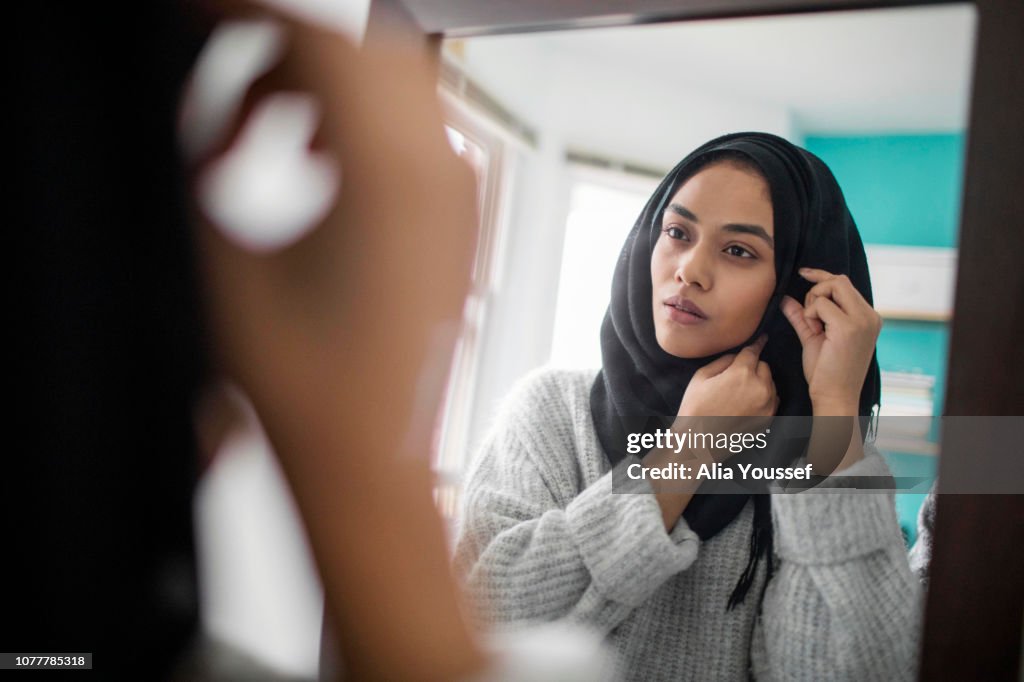 Woman Pinning Her Hijab