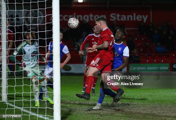 Billy Kee of Accrington Stanley scores his team's first goal past Bartosz Bialkowski of Ipswich Town during the FA Cup Third Round match between...