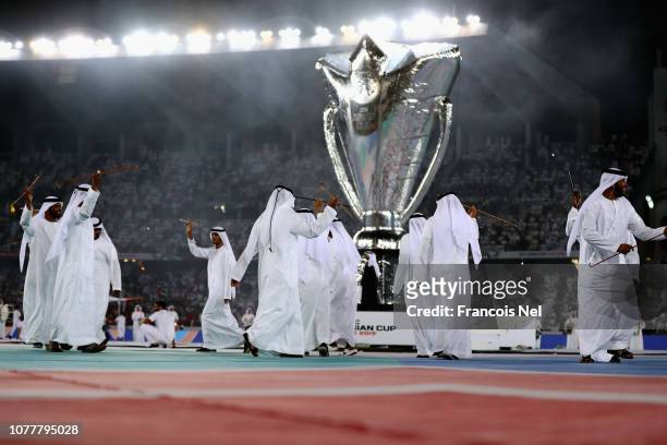 Dancers perform at the Opening Ceremony ahead of the AFC Asian Cup Group A match between United Arab Emirates and Bahrain at Zayed Sports City...