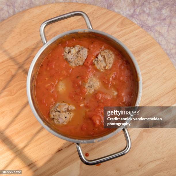 meatballs in tomato sauce - madeira material stock-fotos und bilder