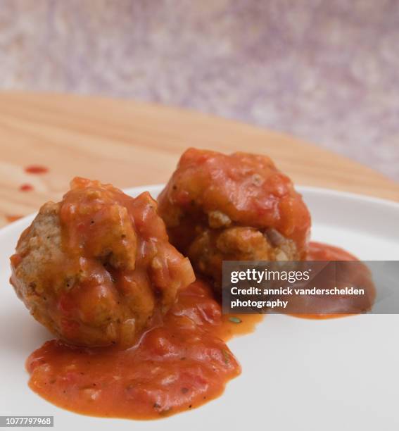 meatballs in tomato sauce - tomato sauce stock pictures, royalty-free photos & images