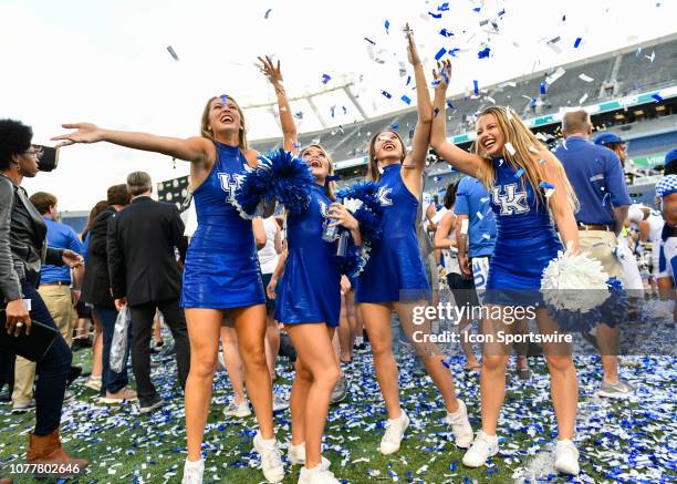 Kentucky cheerleaders celebrate after the awards ceremony of the Citrus Bowl between the Kentucky Wildcats and the Penn State Nittany Lions on...