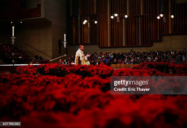 Cardinal Roger Mahony leads Christmas mass at The Cathedral of Our Lady of the Angels December 25, 2010 in Los Angeles, California. Services and...