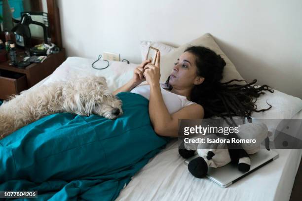 Woman waking up with her dog