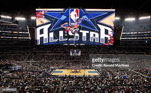 Dwight Howard of the Eastern Conference tips off against Tim Duncan of the Western Conference during the first quarter of the NBA All-Star Game, part...
