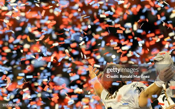 Drew Brees of the New Orleans Saints celebrates after defeating the Indianapolis Colts during Super Bowl XLIV on February 7, 2010 at Sun Life Stadium...