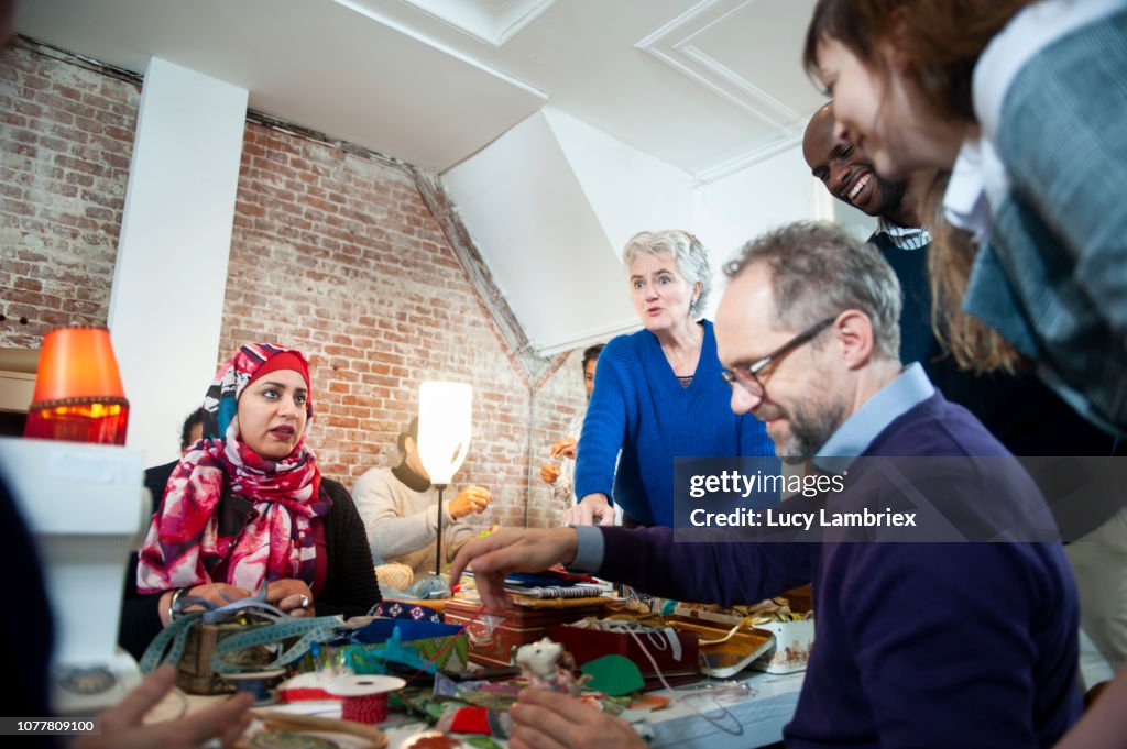 Creative Diverse Business Team Experimenting In Their Workshop High-Res ...