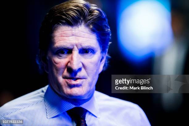 Mike Babcock, head coach of the Toronto Maple Leafs walks to the ice before his team plays the San Jose Sharks at the Scotiabank Arena on November...