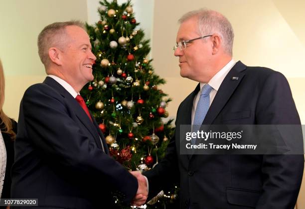 Prime Minister Scott Morrison shakes hands with the Opposition Leader Bill Shorten at the Kmart Wishing Tree Salvation Army Present Collection at...