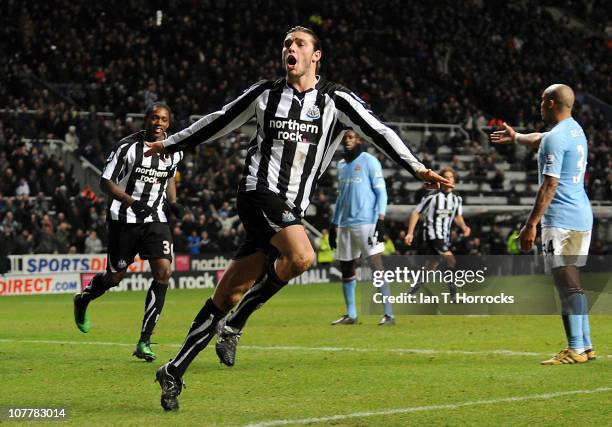 Andy Carroll of Newcastle United celebrates after scoring the 1-2 goal during the Barclays Premier League match between Newcastle United and...
