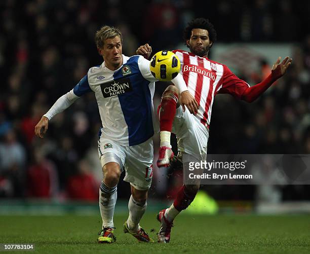 Jermaine Pennant of Stoke City battles with Morten Gamst-Pedersen of Blackburn Rovers during the Barclays Premier League match between Blackburn and...