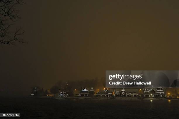 Boathouse Row stays lit along the Schuylkill River as snow falls during a blizzard on December 26, 2010 in Philadelphia, Pennsylvania.