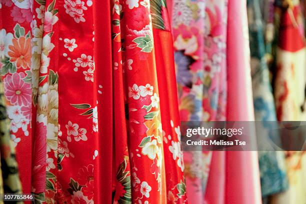 variety of asian silk robes and kimonos - silk china stock pictures, royalty-free photos & images