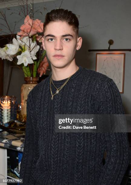 Hero Fiennes Tiffin attends a VIP dinner celebrating the What We Wear x Filling Pieces sneaker collaboration during London Fashion Week Men's January...