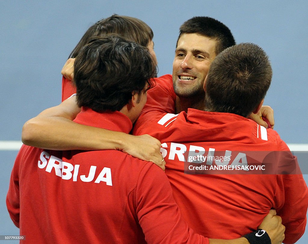 Novak Djokovic of Serbia reacts after wi