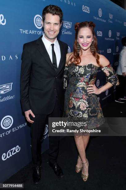 Drew Seeley and Amy Paffrath attend Michael Muller's HEAVEN, presented by The Art of Elysium, on January 5, 2019 in Los Angeles, California.