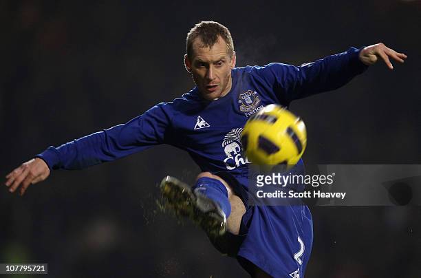 Tony Hibbert of Everton controls the ball during the Barclays Premier League match between West Ham United and Everton at the Boleyn Ground on...
