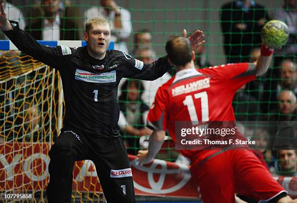 Johannes Bitter of Hamburg and Marcus Hock of Ahlen-Hamm in action during the Toyota Handball Bundesliga match between HSG Ahlen-Hamm and HSV Hamburg...