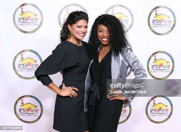 Andrea Navedo poses with a guest at A Place Called Home's 18th Annual Gala For The Children at The Beverly Hilton Hotel on December 05, 2018 in...