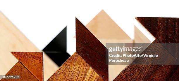 wooden geometric shapes - pajarita stock-fotos und bilder
