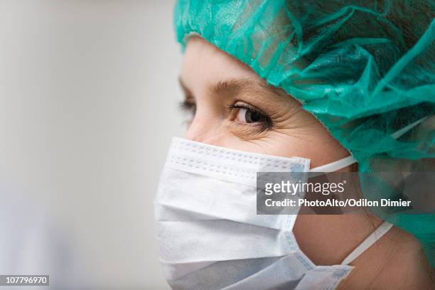 surgical nurse, close-up - protective face mask side stock pictures, royalty-free photos & images