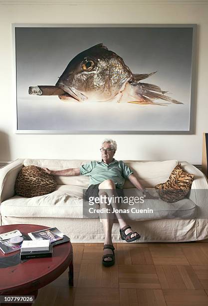 Famed photographer Elliot Erwitt poses for a portrait session on March 2 at his home in New York, New York.