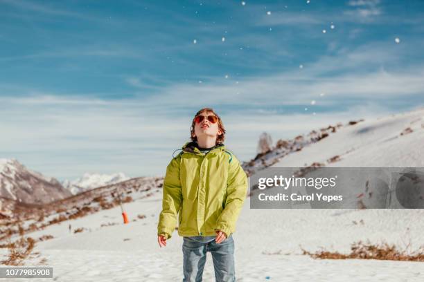 boy playing snow - andalucian sierra nevada stock pictures, royalty-free photos & images