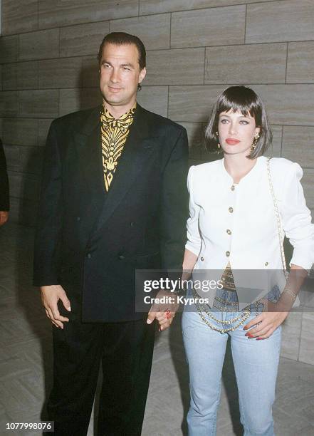 American actor, film producer, screenwriter, martial artist, and musician Steven Seagal with his wife, American-born English actress and model Kelly...