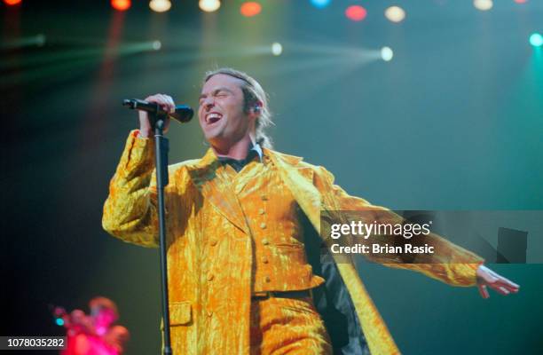 Scottish singer Marti Pellow performs live on stage with pop group Wet Wet Wet at Wembley Arena in London on 26th June 1995.