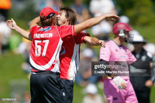 Richard Sherlock of the Wizards celebrates with team mate Carl Frauenstein after the wicket of Herschelle Gibbs of the Knights during the HRV Cup...