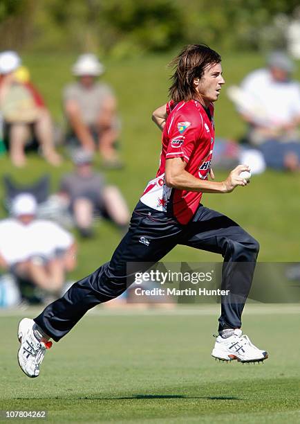 Richard Sherlock of the Wizards bowls during the HRV Cup Twenty20 match between the Canterbury Wizards and the Northern Knights at AMI Stadium on...