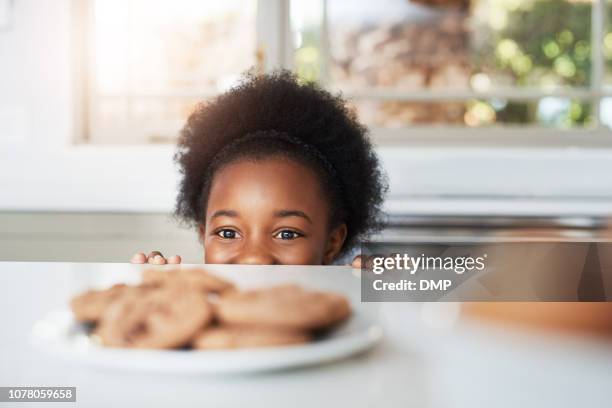 i can't take my eyes off them - kid peeking stock pictures, royalty-free photos & images