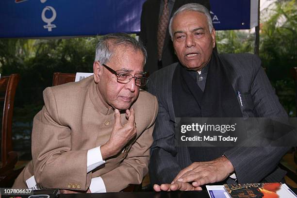 Finance Minister Pranab Mukherjee and senior BJP leader Yashwant Sinha during a function to celebrate 10 years of South Asian Free Media Association...