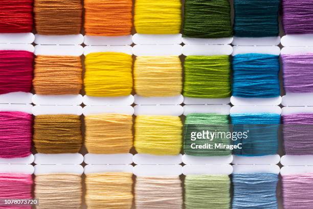 colorful embroidery thread - group c imagens e fotografias de stock