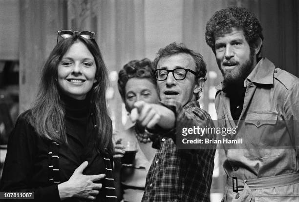 American film director and actor Woody Allen and actors Diane Keaton and Tony Roberts during the filming Allen's movie 'Annie Hall,' New York, New...