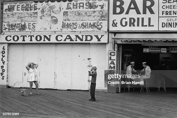 Scene on the Coney Island boardwalk during the filming of the Allen-directed movie 'Annie Hall,' New York, New York, 1977.