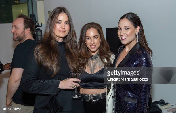 Cori Seaberg, Nicole Rose Stillings and Toby Milstein attend the Burnett New York Pre-Fall Fashion Presentation and Launch Party at The Glasshouses...