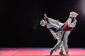 Man and woman taekwondo combat