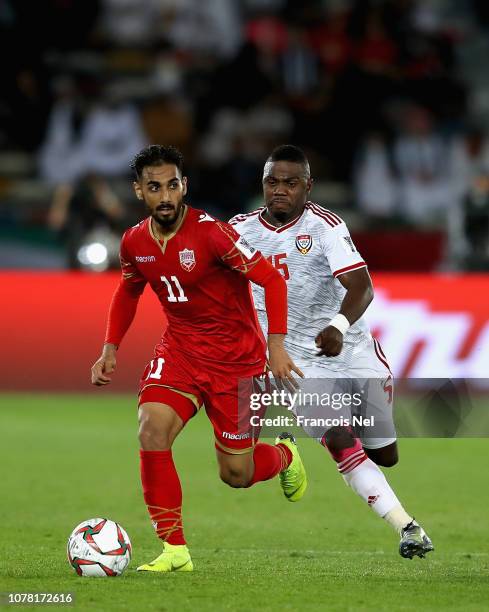 Ali Jaafar Madan of Bahrain in action during the AFC Asian Cup Group A match between United Arab Emirates and Bahrain at Zayed Sports City Stadium on...