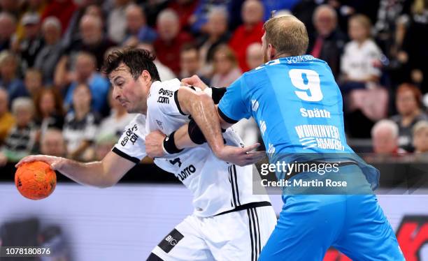 Domagoj Duvnjak of Kiel challenges Manuel Spaeth of Stuttgart during the DKB HBL Bundesliga match between THW Kiel and 1898 Stuttgart at Sparkassen...