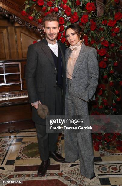 David and Victoria Beckham attend the Kent & Curwen presentation during London Fashion Week Men's January 2019 at Two Temple Place on January 6, 2019...