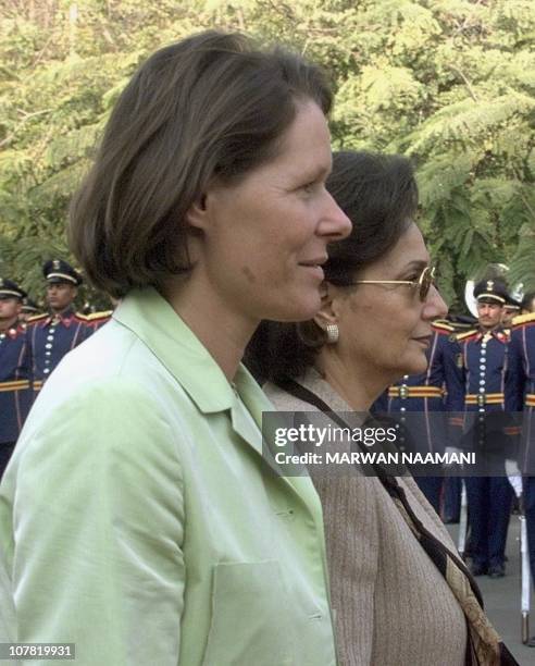 Christina , wife of German President Johannes Rau, inspects honor guards with Suzanne Mubarak, wife of Egyptian President Hosni Mubarak, at Cairo...