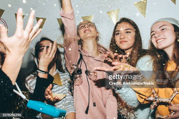 teenagers celebrating new year's eve - parties stock pictures, royalty-free photos & images