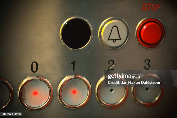 elevator interior with elevator buttons - aufzug knopf stock-fotos und bilder