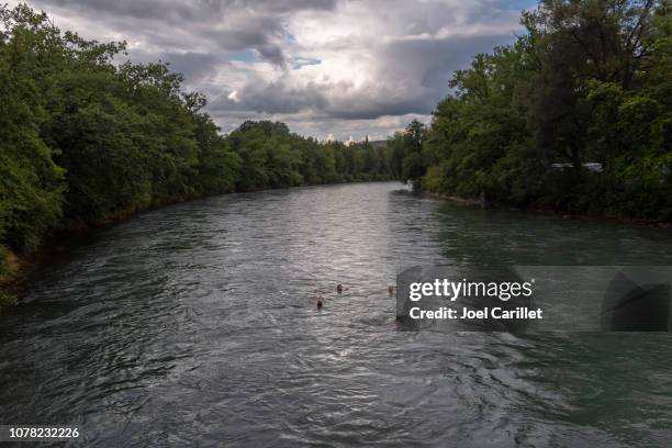 swimming in aare river in bern, switzerland - berne canton stock pictures, royalty-free photos & images