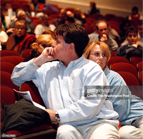 Town meeting on the Saudi School, held in Broad Run High School, Ashburn, VA. During the town meeting, an undicided couple. This is Adam O'Kane and...