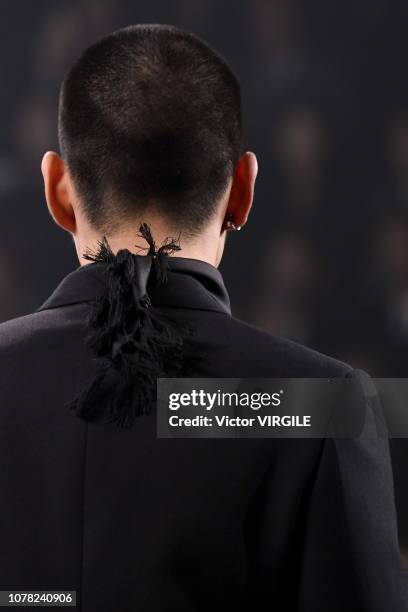 Model walks runway during the Dior Pre-Fall 2019 Men's Collection fashion show at Telecom Center on November 30, 2018 in Tokyo, Japan.