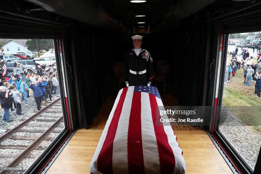 Funeral Train Carries President George H.W. Bush's Casket To Bush Presidential Library In College Station