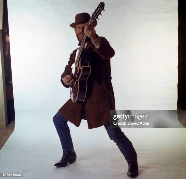 Levon Helm of the roots rock group The Band poses for a portrait in 1969 in Saugerties, New York.